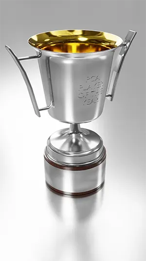 product render of a sterling silver trophy in the shape of a two-handled cup with silver gilt interior